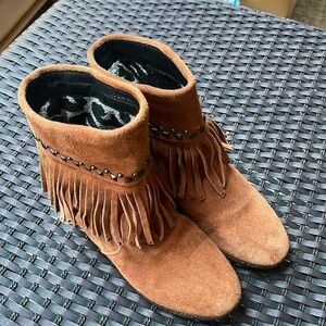 Rick lined moccasins. marked 1.5 which is a Mexican size women’s 4
